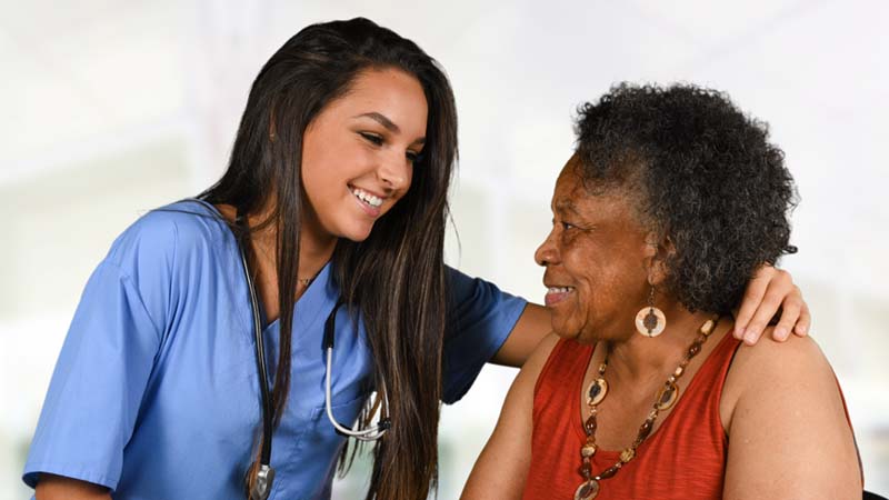 Healthcare worker with patient