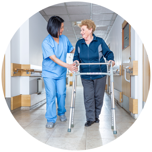 Circle with healthcare worker helping an older patient with a walker