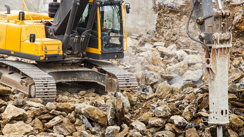 Rock crushing at demolition site