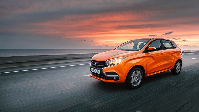 Orange car on road