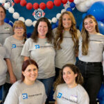 volunteers attending star spangled baby shower