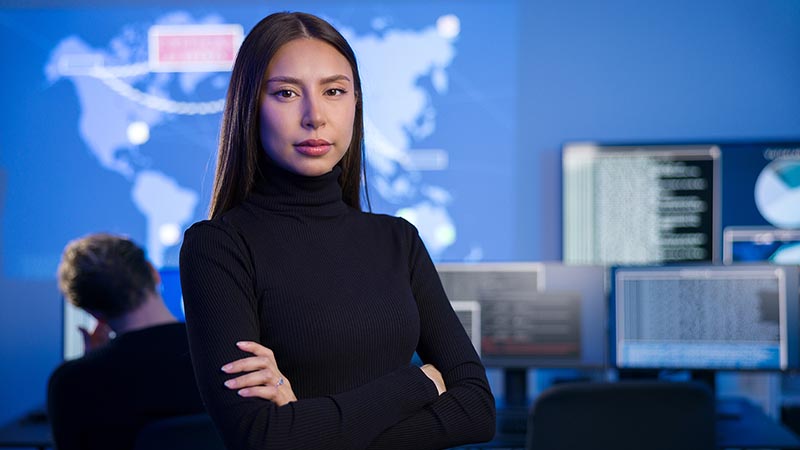 Woman in front of computers